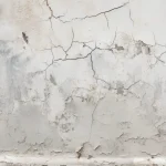 Damaged plaster on an internal masonry wall